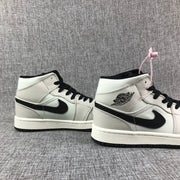 Air Jordan 1 Mid Grey and Black High-Top Sneakers