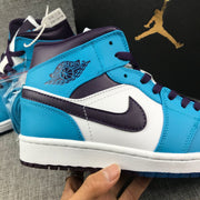 Air Jordan 1 Mid Sneakers in Blue, White and Black