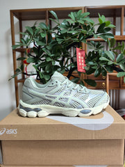 ASICS GEL-Cumulus 16 Sneakers in Gray and Fluorescent Green