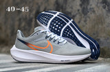 Nike Zoom Running Shoes in Smoke Gray and Orange